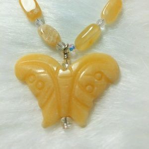 Handmade carved butterfly necklace